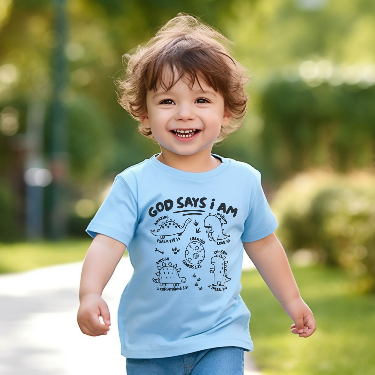 God says I am Dinosaurs Kid's Christian Graphic Tee