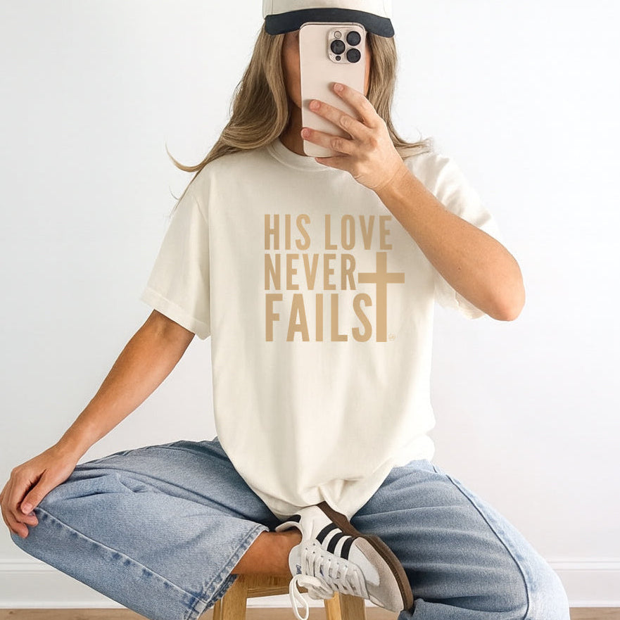 His Love Never Fails Cross Tee
